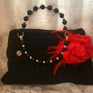 Pinstrip Purse with feather accent and bead handle